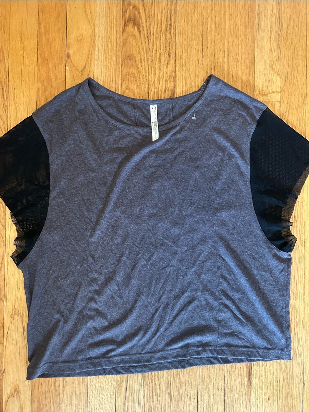 Free people movement Gray Short Sleeve Women’s Top with Black Mesh Sleeves